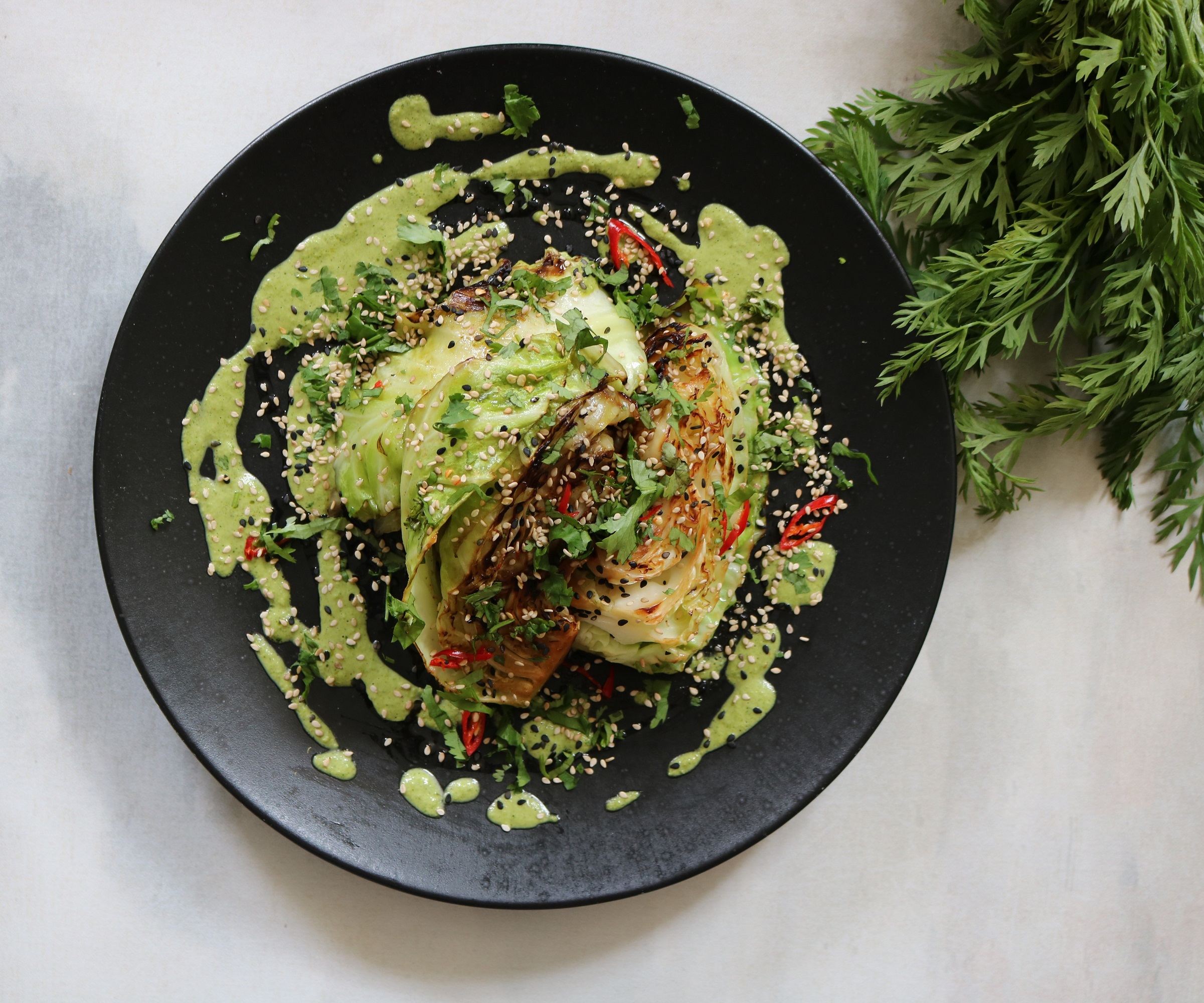 Seared Cabbage with Carrot Tops